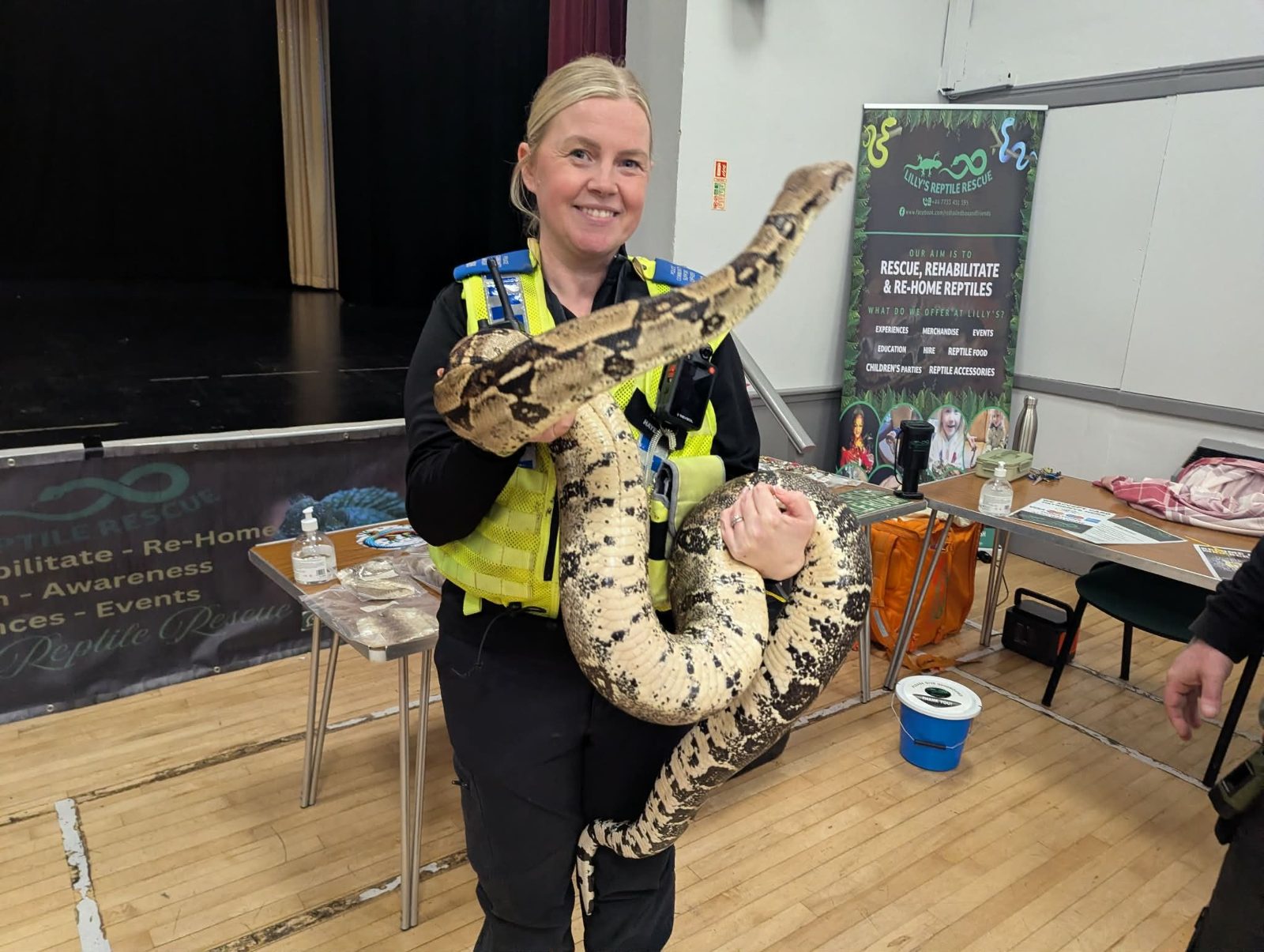 A large python held at the rescue